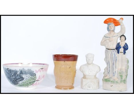 A selection of 19th century ceramics to include a Staffordshire figurine group of sailor and boy, a Sunderland lustre / pearl