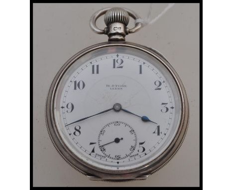 A hallmarked silver early 20th century pocket watch by&nbsp;Dennison having a white enamel face with faceted hands and subsid