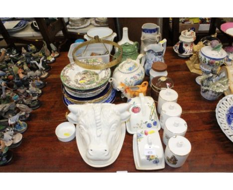 A quantity of various china to include a cheese dish in the form of a cows head, a cow creamer, a Copeland Spode vase, storag