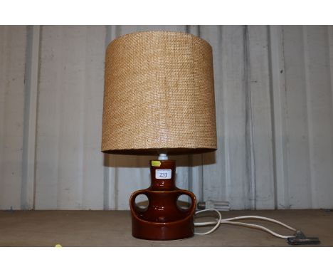 A Kabaka ware brown glazed pottery table lamp with shade 