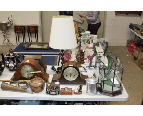 An oak cased three hole mantel clock and two table lamps 