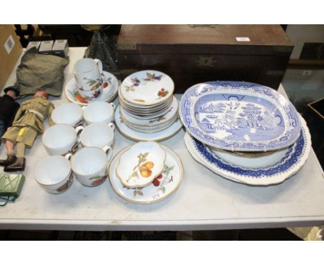 A quantity of Royal Worcester "Evesham" pattern teaware; a blue and white willow pattern meat plate; two large Grindley blue 