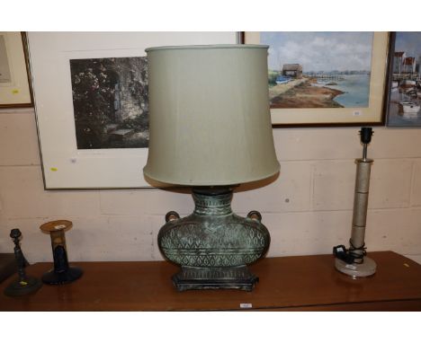 A bronzed Oriental archaic style table lamp and shade