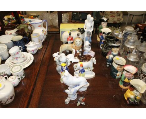 A quantity of various ornaments to include Nao, Royal Crown Derby "Imari Blue", boxed Leonardo Collection ram etc. 