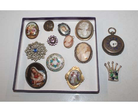 A silver cased Half Hunter pocket watch and a collection of brooches to include two cameo brooches, portrait brooches etc