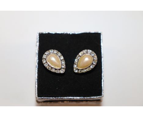 A pair of silver, pearl and diamanté ear-rings