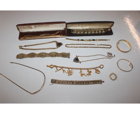 A rolled gold bangle; various gold tone jewellery including bracelets and necklaces