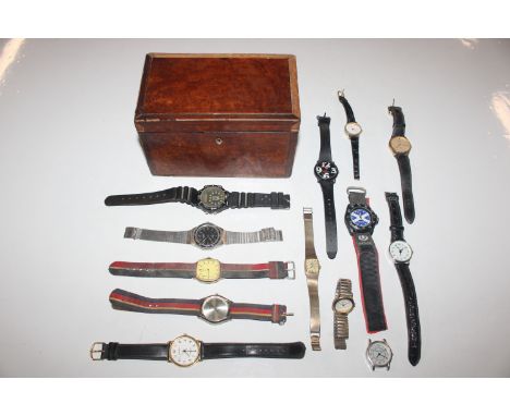 A box containing a tea caddy; various coinage; pewter napkin rings; a Citizen wrist watch and other wrist watches