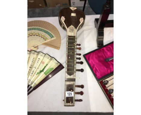 An Indian sitar string instrument