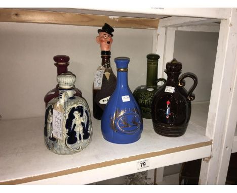 5 ceramic & 1 glass decanter including 2 musical
