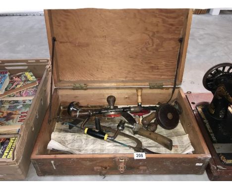 A wooden tool box & contents