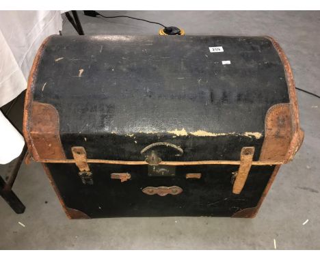 A dome top trunk with inner tray