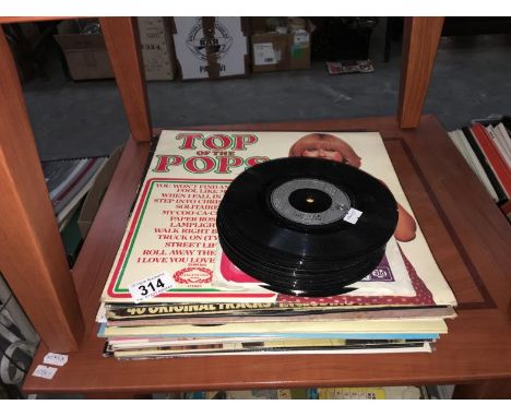 A large quantity of records including Elvis, Rolling Stones etc