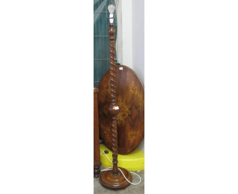 20th Century oak standard lamp with entwined snake spiral decoration on circular base. 