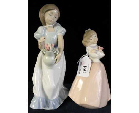 Two Spanish porcelain figurines of young girls Nadal and Nao. (2)
