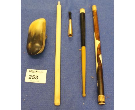 Bag containing art deco cigarette holder, horn snuff box, various other smoking paraphernalia, holders etc.