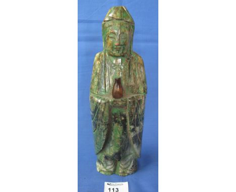 Heavy probably Chinese carved hardstone standing figure of the Goddess Guanyin holding a flask. 