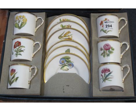 Set of six Royal Worcester Convolvulus coffee cans and saucers in original box. 