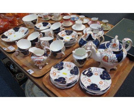 Three trays of 19th Century Gaudy Welsh tulip design teaware items to include cups and saucers, teapot, lidded sucrier, milk 