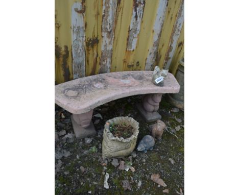 A PINK PAINTED COMPOSITE CURVED GARDEN BENCH 116cm x height 40cm along with a small planter and three small animal garden orn