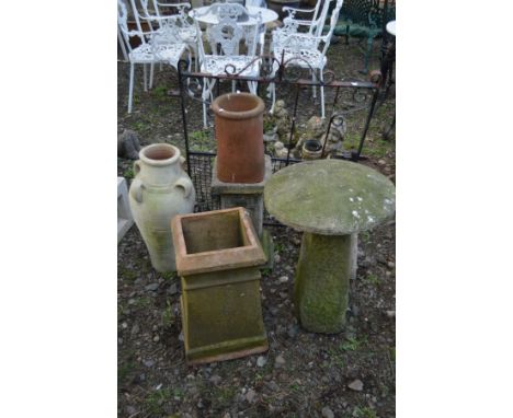 A RECONSTITUTED STONE STADLE STONE, diameter 44cm x height 69cm, along with a square terracotta planter, terracotta urn with 