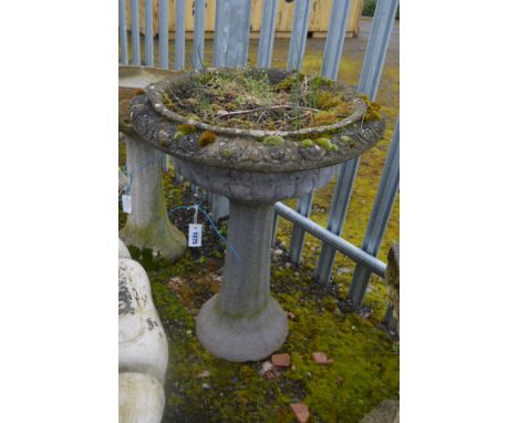 A COMPOSITE CIRCULAR CAMPANA PLANTER on a separate high tulip style base, 58cm x height 76cm