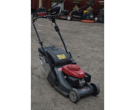 A HONDA HRX 426C PETROL SELF PROPELLED ROLLER LAWNMOWER with grassbox