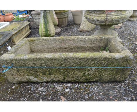 A RECTANGULAR SANDSTONE TROUGH, length 95cm x depth 46cm height 26cm