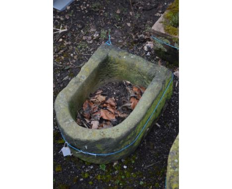 A SANDSTONE WATER TROUGH, width 42cm x depth 54cm x height 25cm