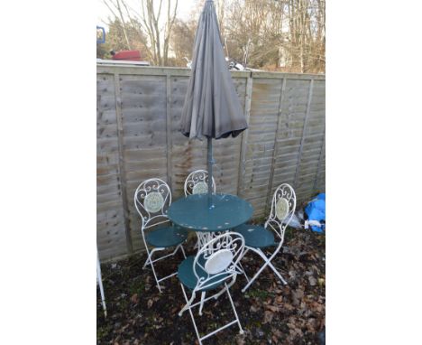 A WHITE AND GREEN PAINTED WROUGHT IRON CIRCULAR GARDEN TABLE, with tile inserts, diameter 40cm x height 74cm with a parasol, 