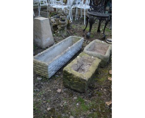 A SMALL SANDSTONE TROUGH, length 39cm along with two composite rectangular troughs (3)