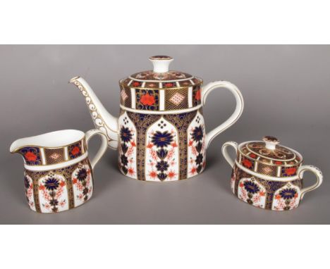 A Royal Crown Derby Old Imari pattern 3 piece teaset. Comprising of teapot, milk jug and lidded sugar bowl.  No cracks, chips