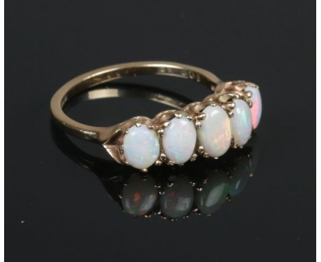 A 9ct gold 5 opal ring. Size Q. 2.68g  