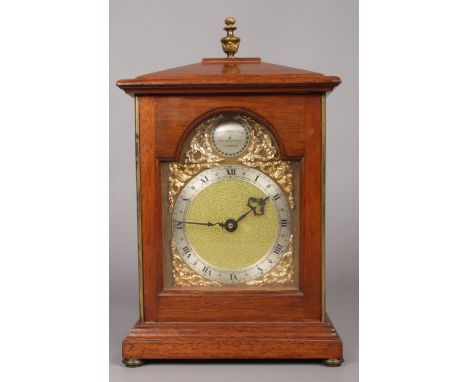 A Thwaites and Reed mahogany cased mantle clock with jewel to the centre of the movement.  Not running. Case good. Slight wea