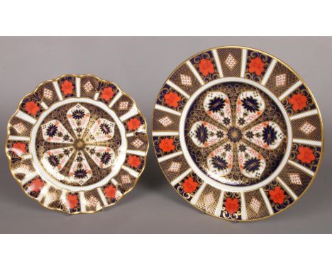 Two Royal Crown Derby plates in the Imari pattern. Including scalloped edge example, etc. (27cm and 22cm).  Good condition. F