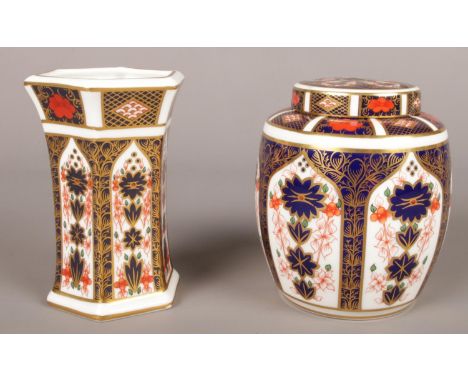 A Royal Crown Derby Imari pattern ginger jar, pattern number 1128 along with a matching small vase (11.5cm).  Ginger jar lid 