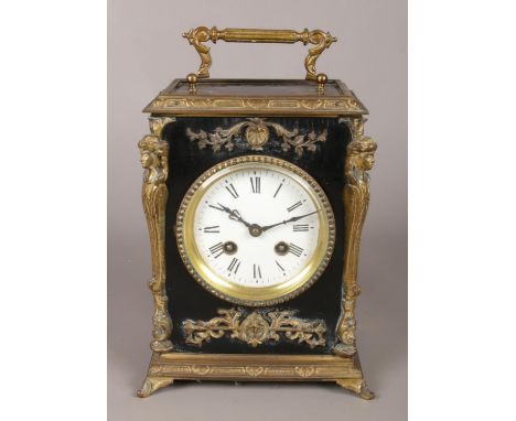 A lacquered eight day bracket clock with ormolu mounts.  