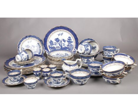 A collection of Booths 'Real Old Willow' tea and dinner ware. cups/saucers, various plate sizes, milk jug etc.  