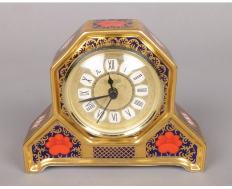 A Royal Crown Derby Old Imari pattern mantel clock. With quartz movement. (11cm tall)  Good condition. First quality.