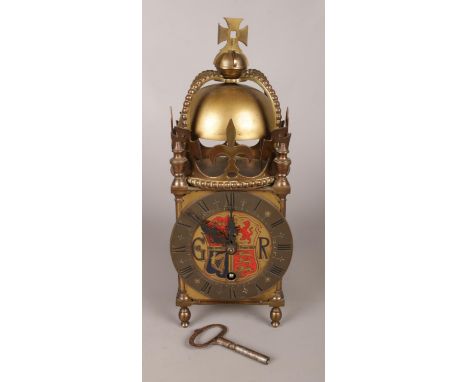 A Davall brass lantern clock commemorating King George VI, 1937. Chiming on the hour. With pendulum and key.  Working.