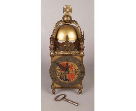 A Davall brass lantern clock commemorating King George VI, 1937. Chiming on the hour. With pendulum and key.  Working.