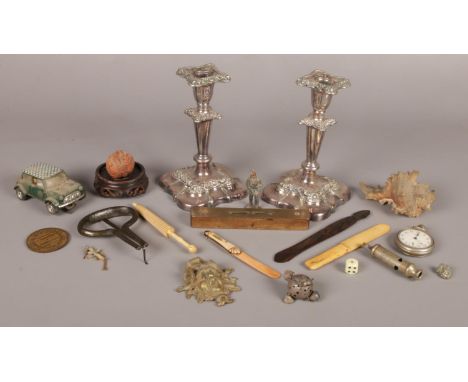 A quantity of collectables. Including Ivory Stanhope formed as an umbrella, bone letter opener, shell, police whistle, pair o