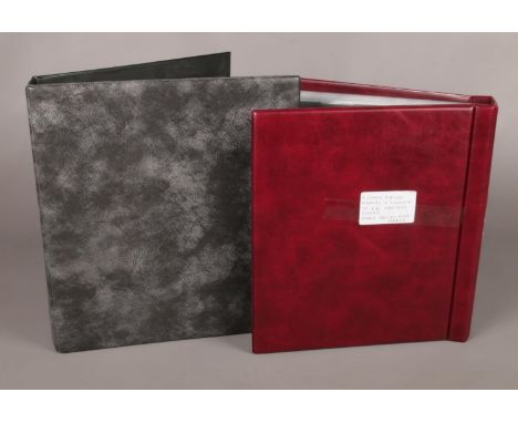 Two large albums holding a collection of GB first day covers, many with special post marks. To include British Paintings, Jan