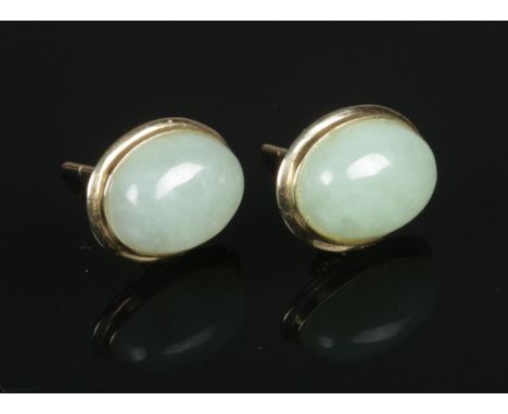 A pair of 9ct Gold jade stud earrings. Total weight: 1.59g  