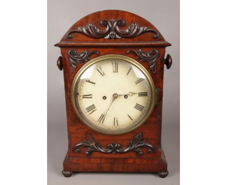 A William IV mahogany cased twin fusee eight day mantle clock, enamel dial, Roman numeral markers and chiming on a bell.  