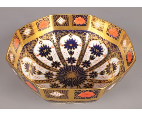 A large Royal Crown Derby octagonal bowl in the Imari pattern. (Diameter 27.5cm x 12cm high)  Severe crack to foot of bowl. F