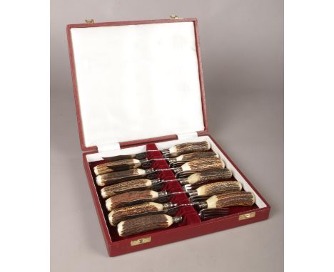 A boxed Edwin Blyde and Co Sheffield, Antler handled six piece knife and fork set.  
