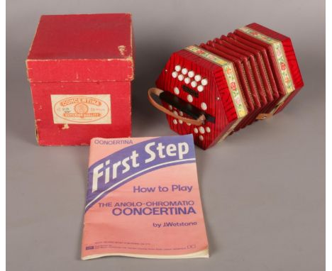 A boxed BM 2118 Concertina with Twenty-one buttons, with First Step Concertina guide.  