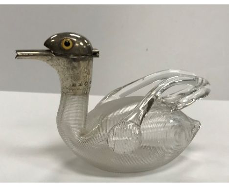 A Victorian blown glass and ribbed duck miniature claret type jug with silver mounts as a duck's head with enamelled eyes (by