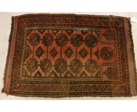 A modern Persian rug with repeating lozenge medallions on a red ground within a red ground border, approx 113 x 76 cm, togeth